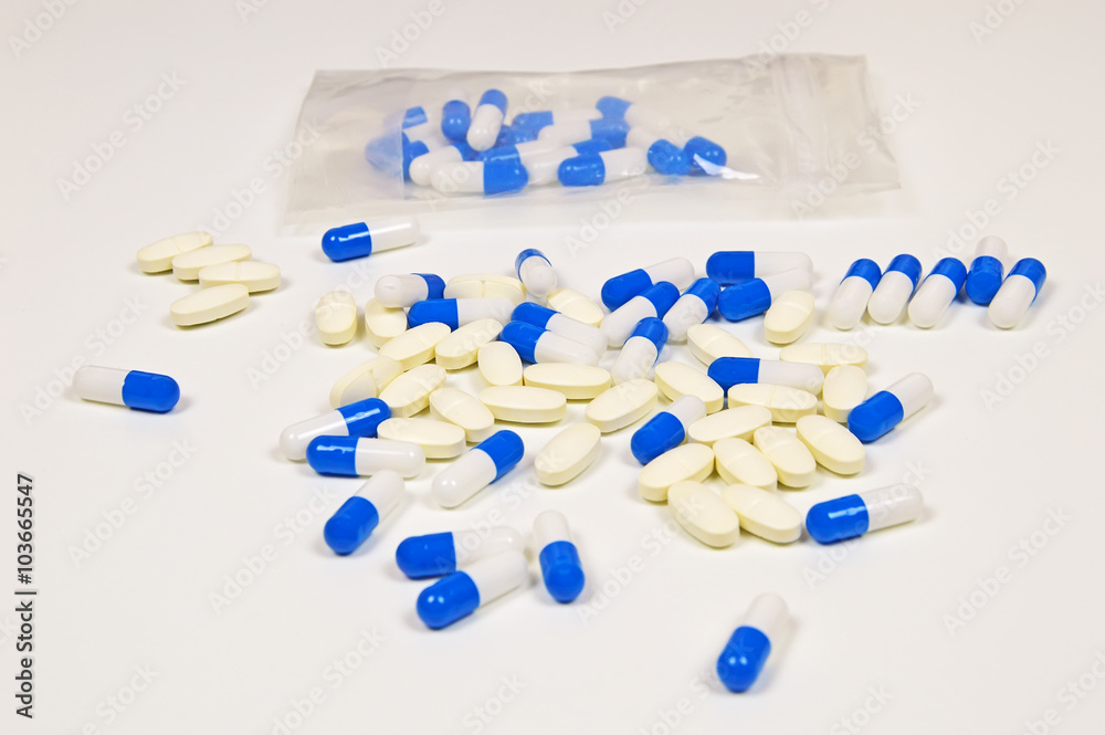 Blue and white capsules Blue and white capsules