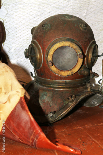 Old, rumpled diving helmet photo