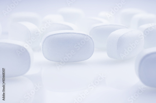 White medicine antibiotic pills.