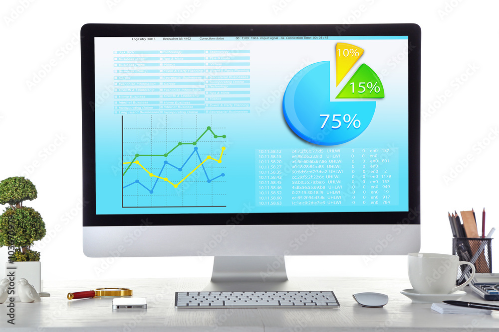Workplace with modern computer, with scheme on screen Workplace with modern computer, with scheme on screen