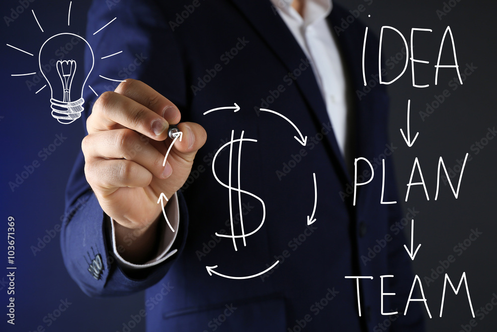 Fototapeta premium Businessman writing on screen, close-up