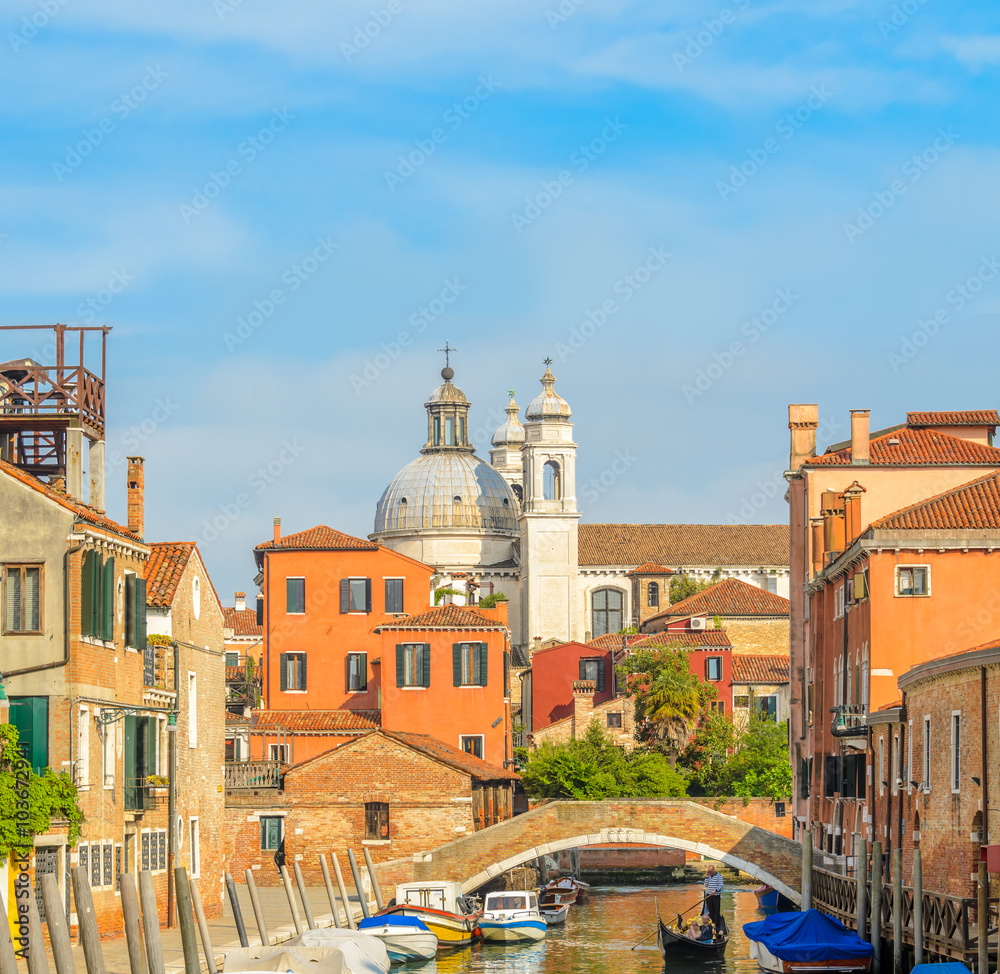 Lovely view on the bridge and the canal of Venice.