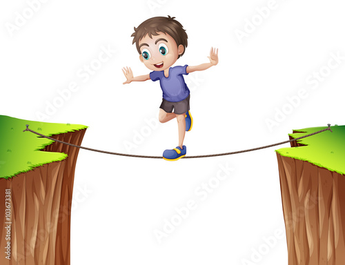 Boy balancing on the rope