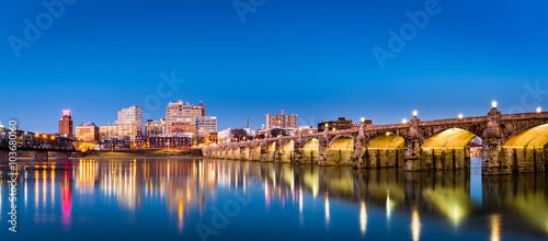 Harrisburg, Pennsylvania skyline with the historic Market Street Bridge reflected on the Susquehanna River at dusk