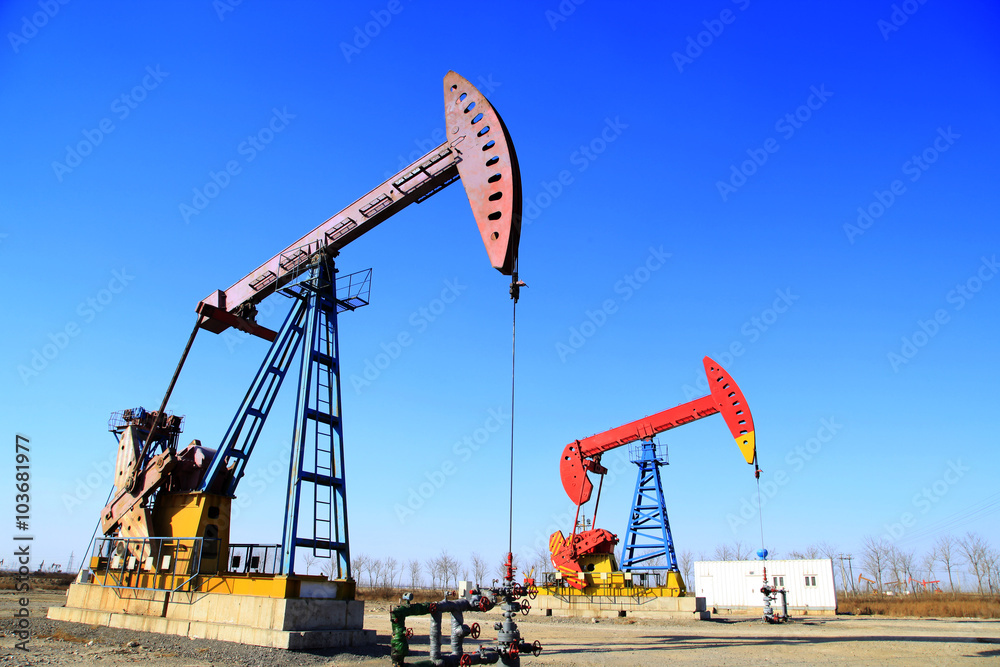 Oil field, oil pump in the work Oil field, oil pump in the work