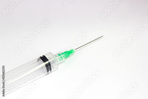 injection tool that has a sharp tip and a white background, commonly used midwife or doctor