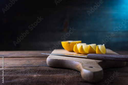 lemons cut on a cutting board