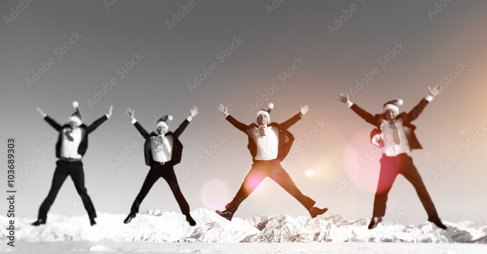 Fototapeta premium Businessmen Celebrating Christmas on Snow Mountain Concept