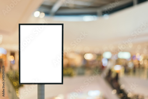 Blank sign with copy space for your text message or content in modern shopping mall.