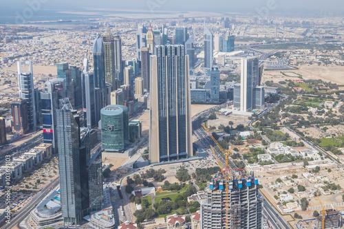 DUBAI, UNITED ARAB EMIRATES -MARCH 17,2015 : Modern skyscrapers in Dubai (emirate and city). Dubai now boasts more completed skyscrapers higher than other city.,taken on 17 MARCH 2015 in Dubai