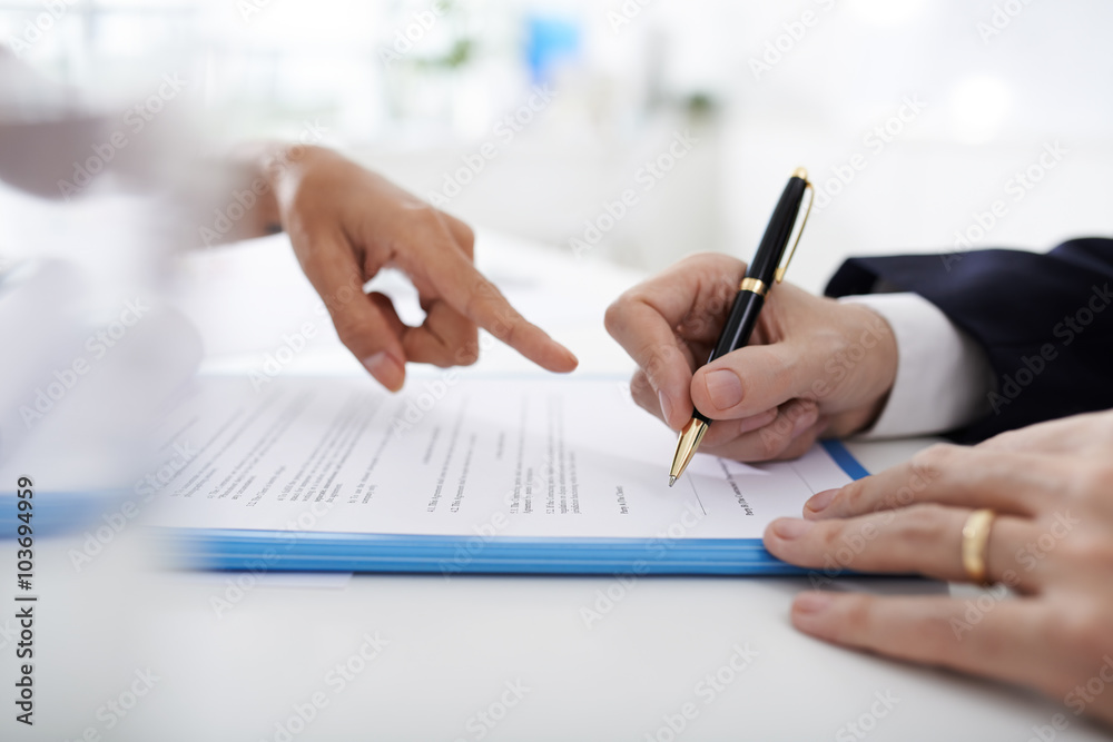 Signing business contract Signing business contract