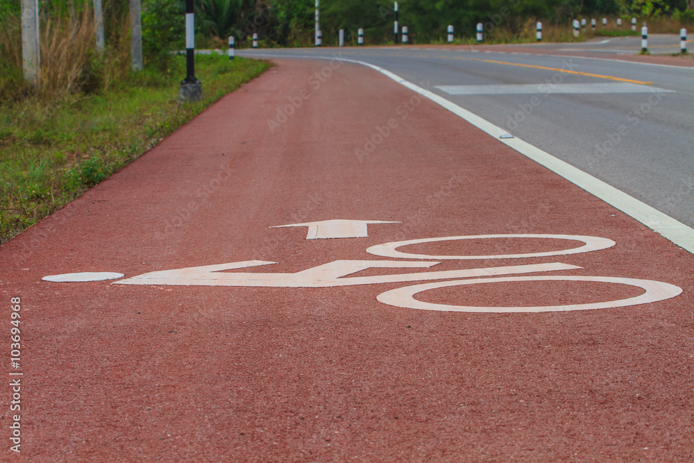 Bicycle road sign on asphalt