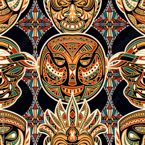 Seamless pattern with tribal mask and aztec geometric latin American ornament. Colorful hand drawn vector illustration