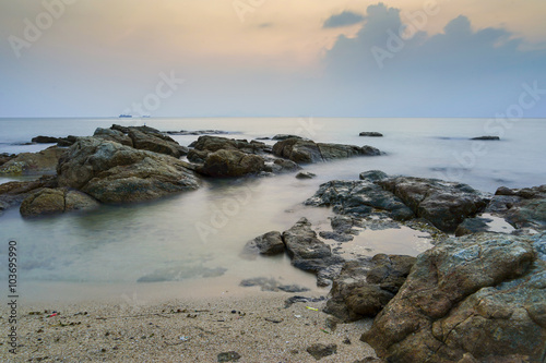 smoke sea rock with twiilight sky © prextimize