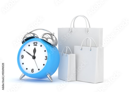 alarm clock and shopping bag (time to buy concept)