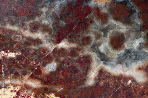 Marble stone texture background. Marble is a non-foliated metamorphic rock composed of recrystallized carbonate minerals, most commonly calcite or dolomite.  photo