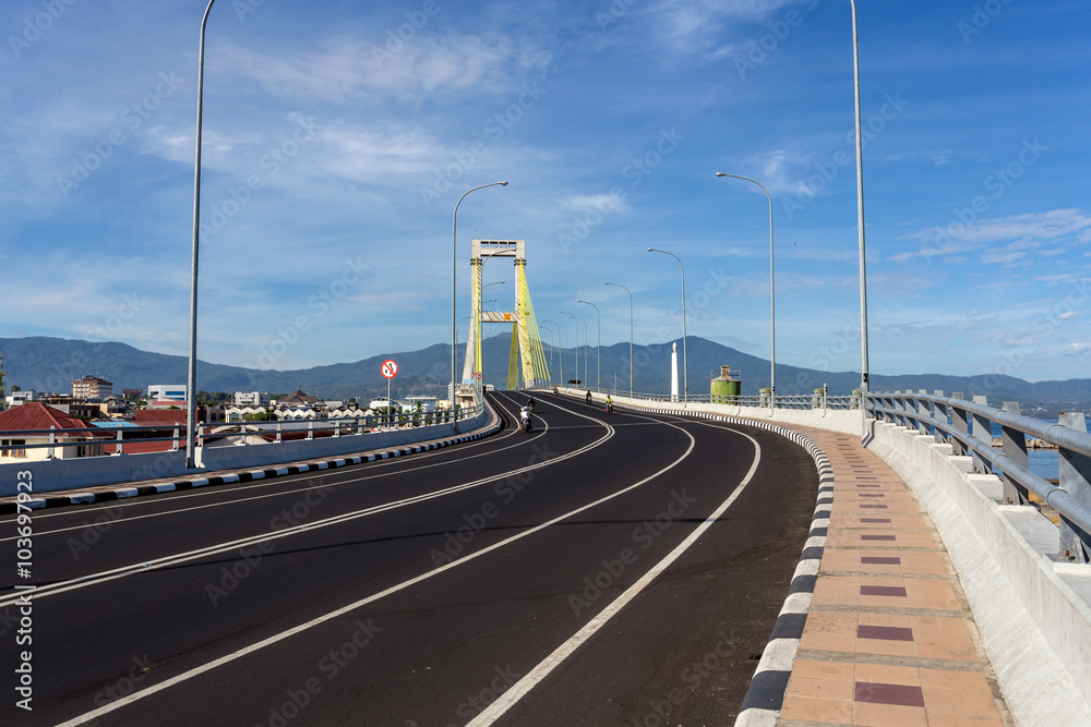 Bridge over the harbor in Manado, Indonesia Bridge over the harbor in Manado, Indonesia