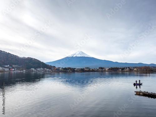 Fuji mountain under cloudy sky with lake © jeafish