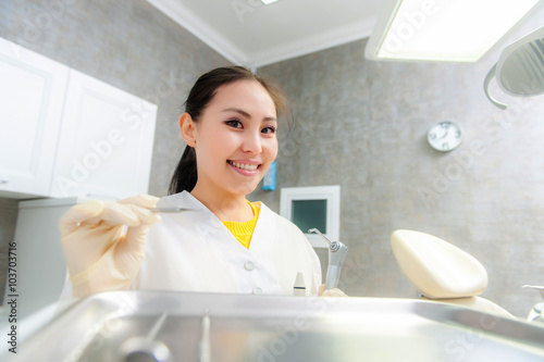 Portrait of a dentist in the office photo