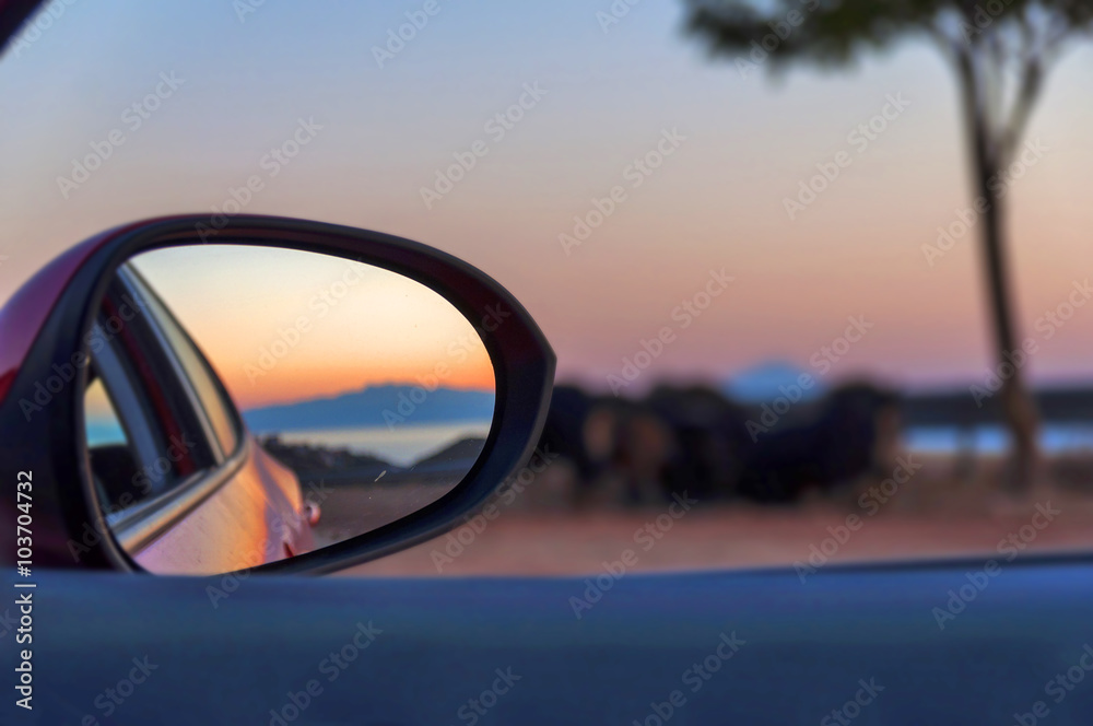 Rear View Mirror Reflection on sun down