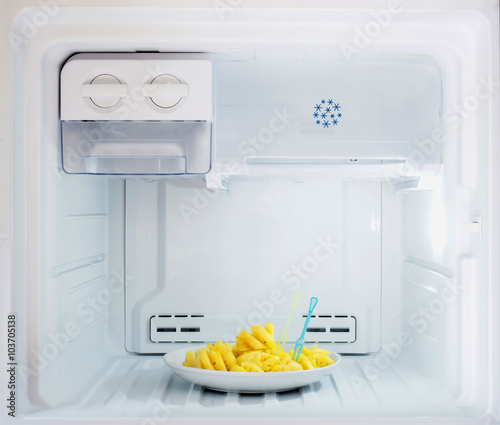 Diet fruit, pineapple dish put in freezer fridge