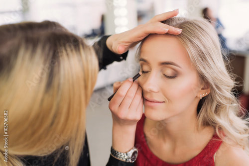 Slika na platnu girl, professional make-up applied in the studio, paint eyes, close-up