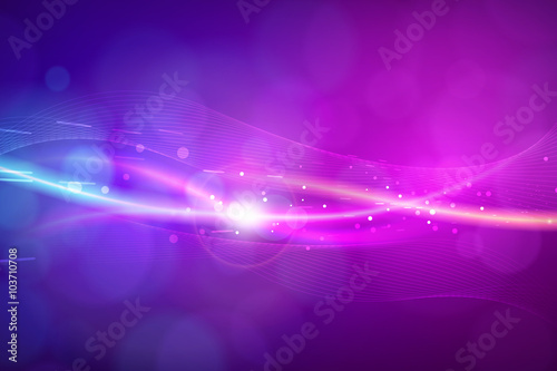 Abstract bokeh color glowing lines and dots with light effects.