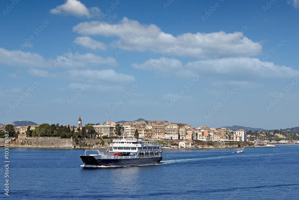 ferry boat sails close to Corfu town