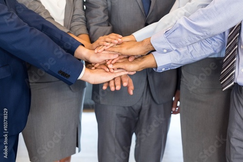Close-up of Businesspeople stacking hands