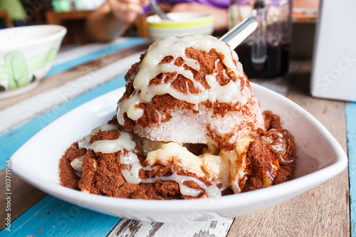 Shave Ice with cocoa and condensed milk.