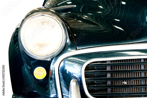Close Up of Headlight Lamp Vintage Classic Car. (Vintage Effect Style)