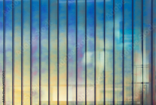 Colorful office wall made of glass  background