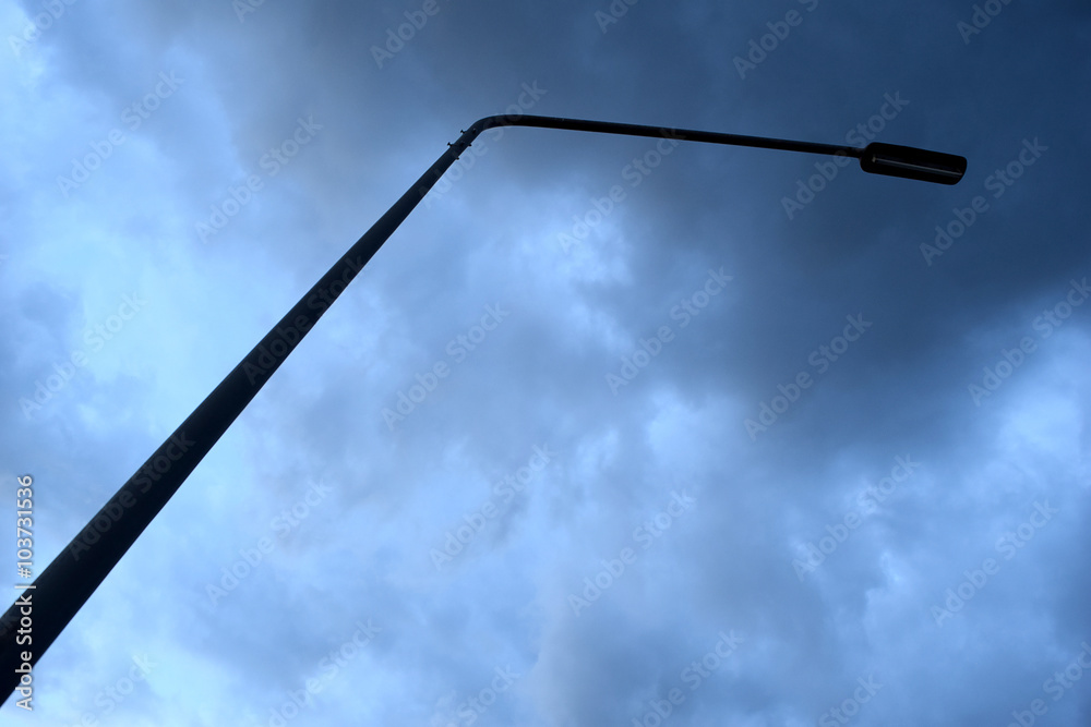 Street light poles and Cloudy storm Street light poles and Cloudy storm