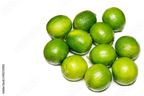 Fresh limes isolated on white.