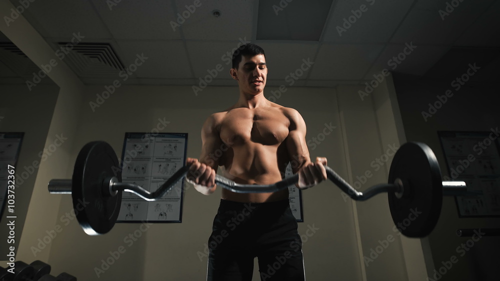 Young athlete trains with fitness equipment Young athlete trains with fitness equipment
