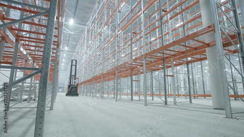 loader goes in the modern and bright warehouse photo