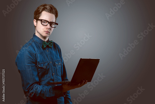 Nerdy Guy with Notebook photo