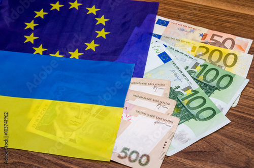 ukraine and europe flag with money