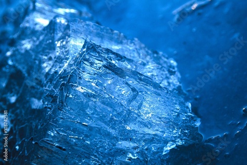 Beautiful piece of ice from the river looks like a precious crystal.