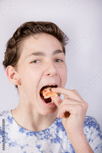 Teenage Boy Eating