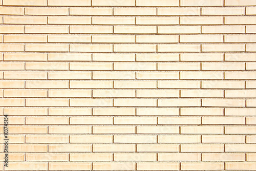 New beige brick wall background texture