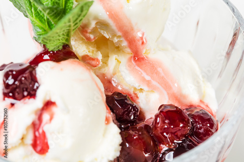 Vanilla ice cream with cherry jam.