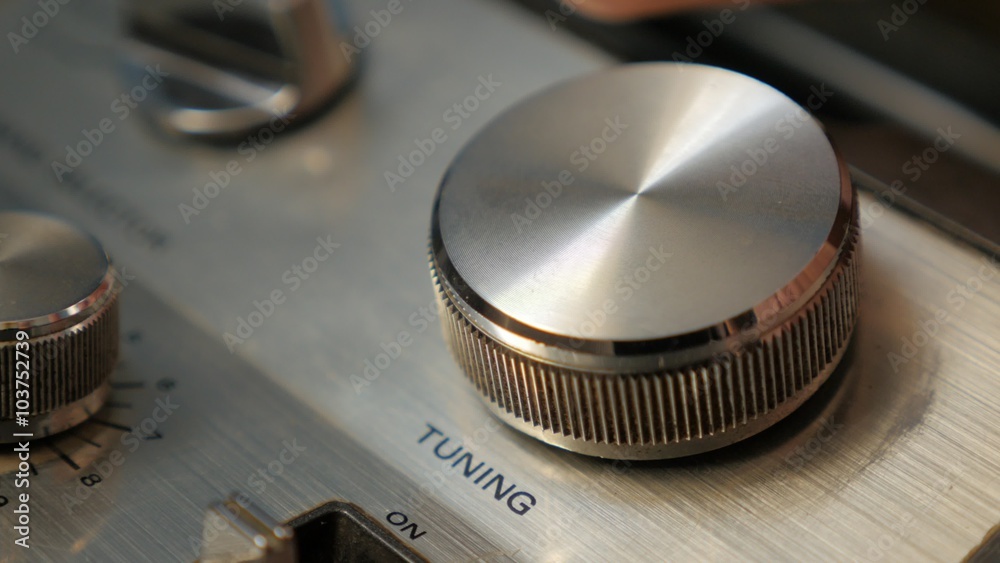Tuning FM radio station on receiver by rotating tuner dial close-up 4K 2160p UltraHD footage - Radio station tune with dial on stereo FM receiver 4K 3840X2160 UHD video 