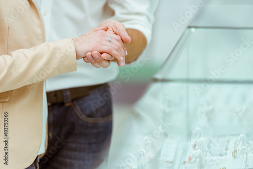 Couple choosing wedding ring