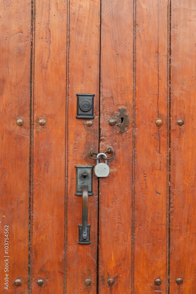 old door with padlock as background old door with padlock as background