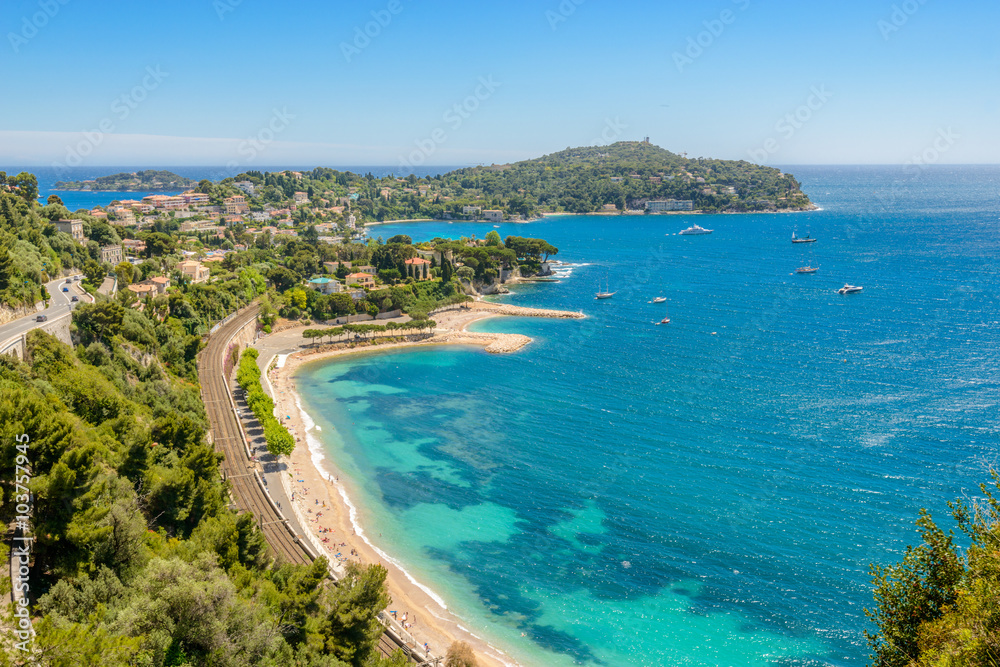 View of luxury resort Villefranche-sur-Mer and bay on French Riviera at Mediterranean Sea. Cote d'Azur. France.