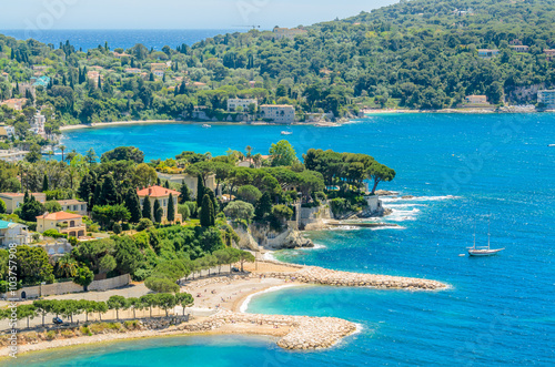 View of luxury resort Villefranche-sur-Mer and bay on French Riviera at Mediterranean Sea. Cote d'Azur. France. photo