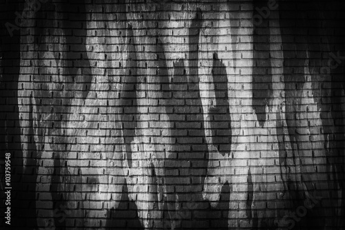 Black and white brick wall, abstract grunge pattern background.
