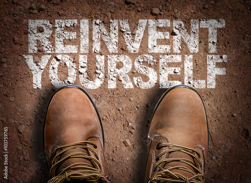 Top View of Boot on the trail with the text: Reinvent Yourself