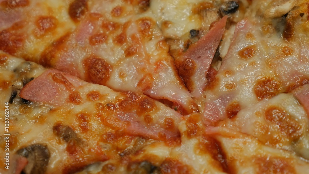 Melted cheese bacon and chamignons spreaded on tasty baked pizza surface 4K 2160p 30fps UHD panning video - Slow pan over fresh Italian pizza texture 4K 3840X2160 UltraHD footage Melted cheese bacon and chamignons spreaded on tasty baked pizza surface 4K 2160p 30fps UHD panning video - Slow pan over fresh Italian pizza texture 4K 3840X2160 UltraHD footage